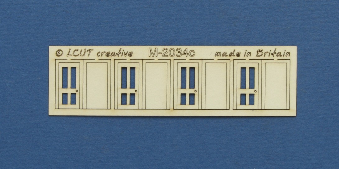M 20-34c N gauge kit of 4 single doors type 1 Kit of 4 single doors. Designed in 2 layers with an outer frame/margin. Made from 0.35mm paper.
